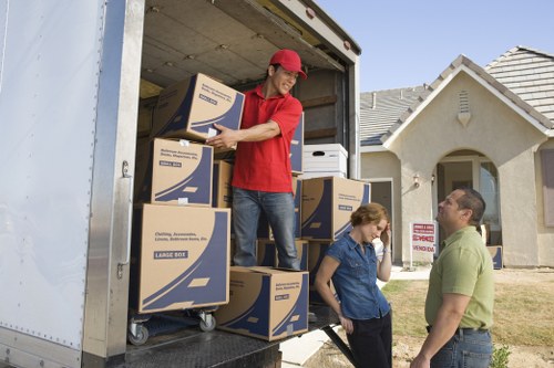Professional movers handling furniture during a Bermondsey relocation