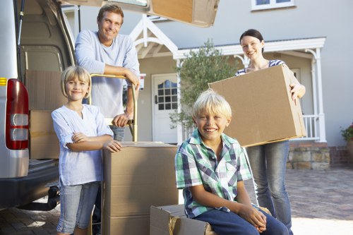 Professional movers handling equipment during a Bermondsey business move