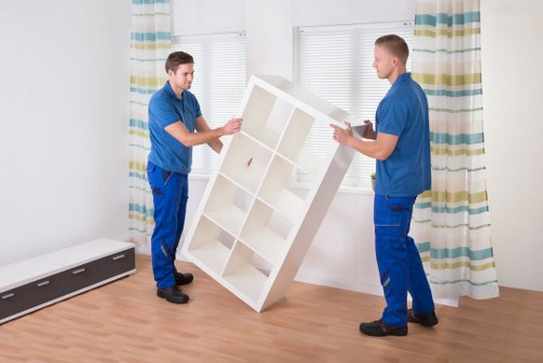 Professional movers organizing items for a smooth relocation