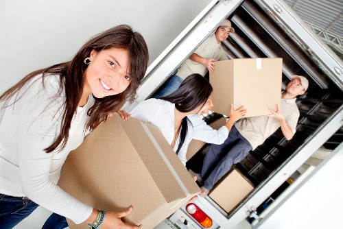Packed moving boxes and furniture ready for removals in Bermondsey