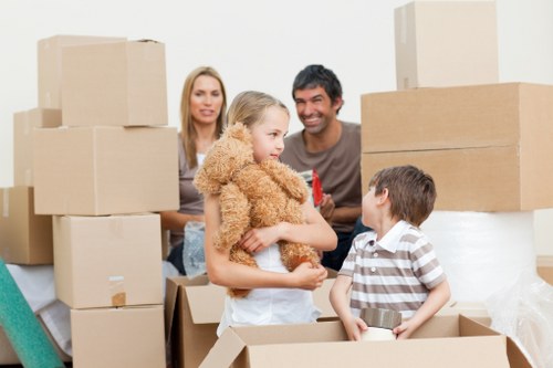 Packed moving boxes and furniture ready for transport